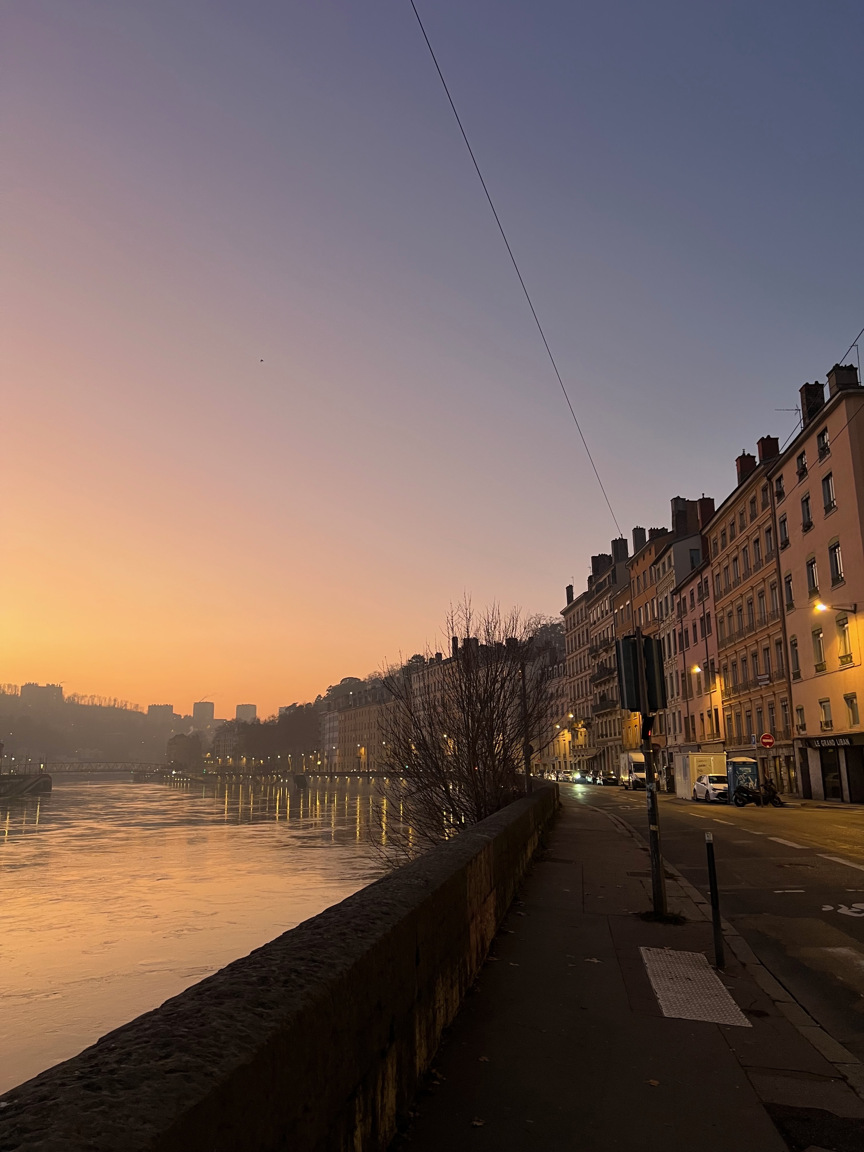 Sunset over the river and city quays